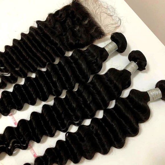 100% human hair boundles and a closure loose wave
